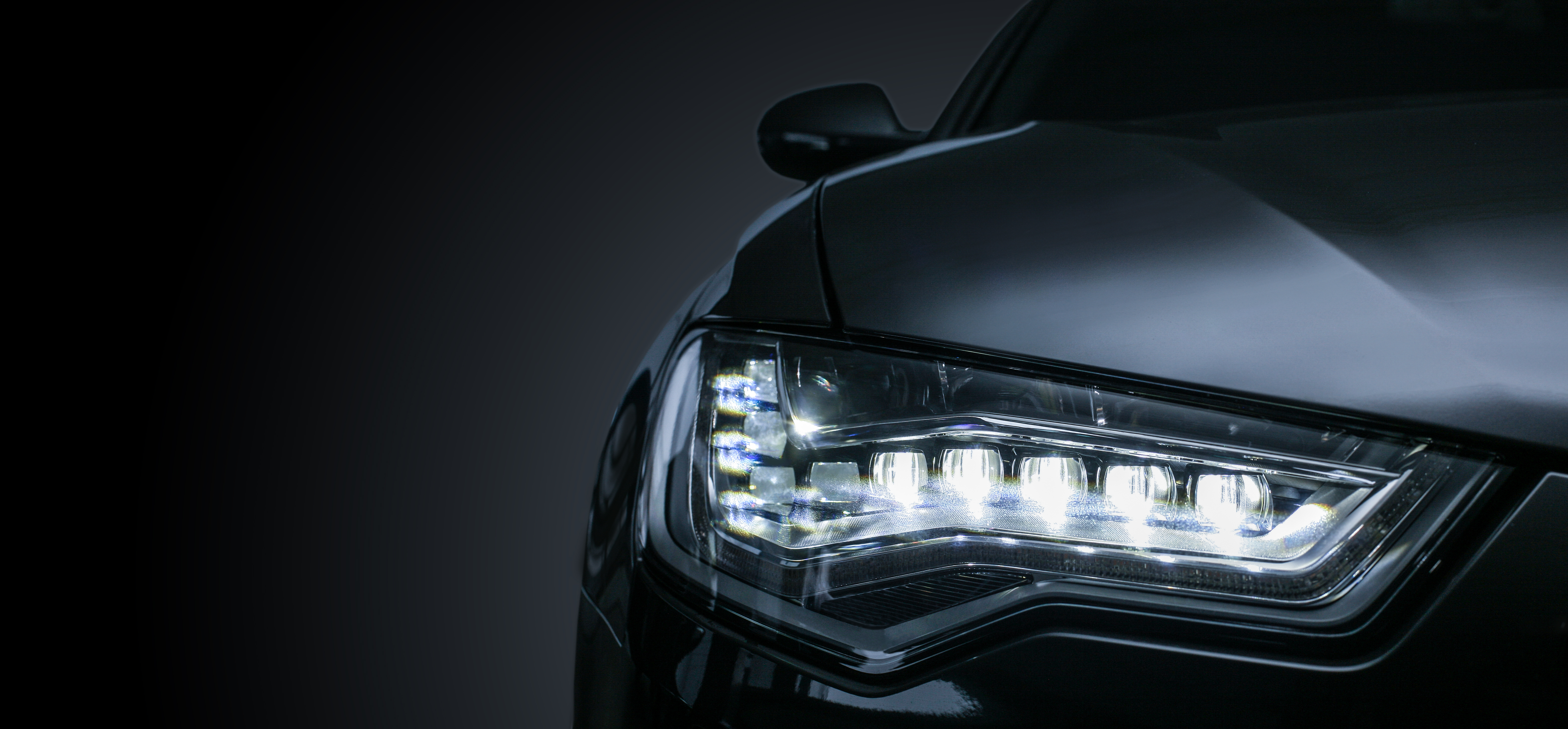 Headlight of modern prestigious car close up.