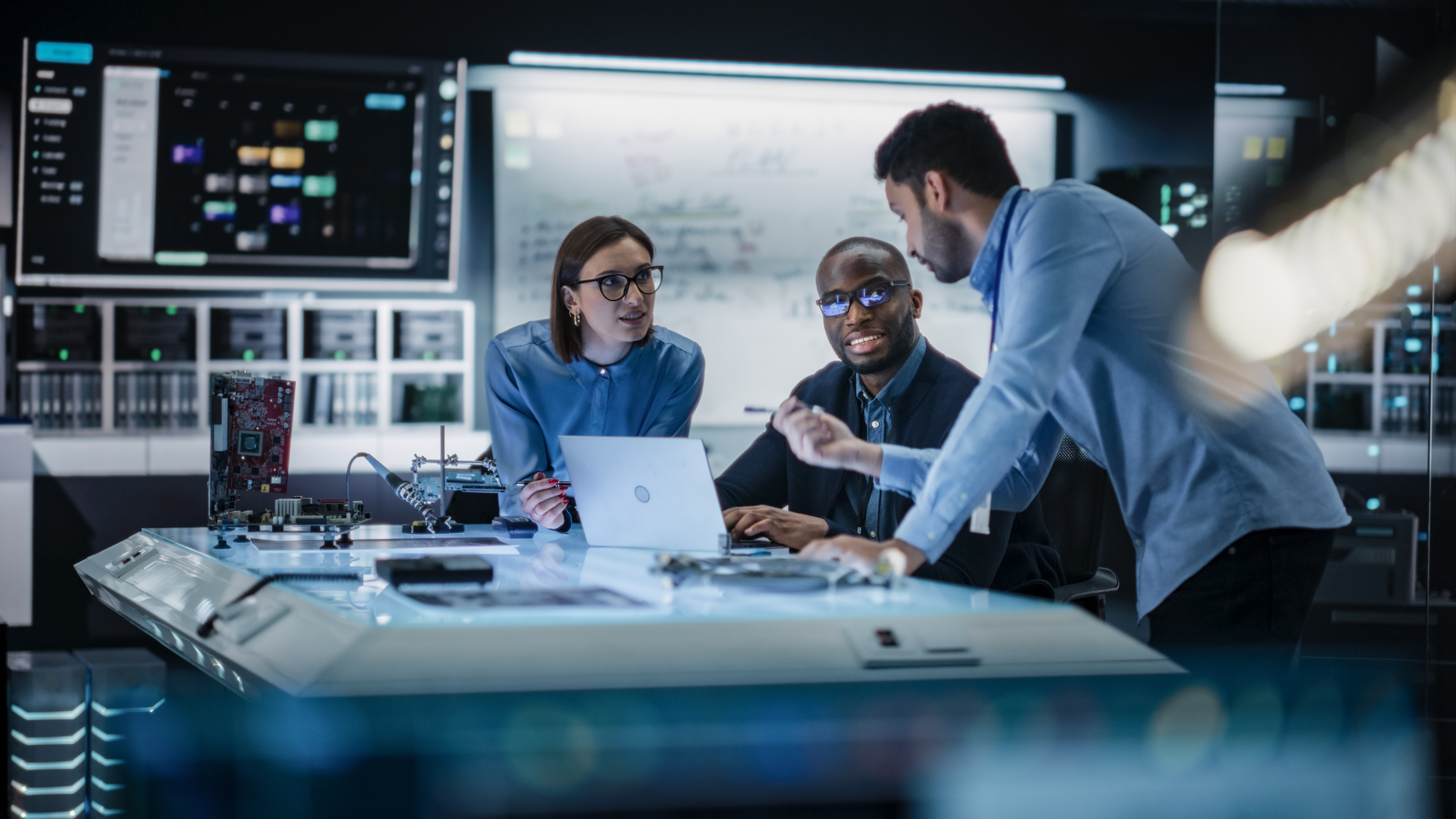 diverse-team-engineers-collaborating-on-LED-manufacturing.